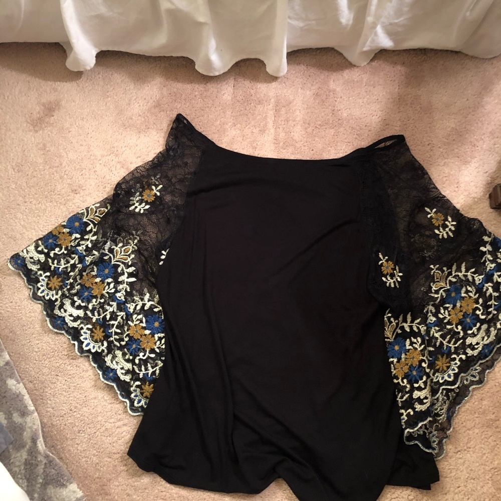 Black shirt with black and blue lace sleeves